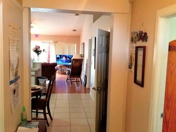 Welcoming hallway at Coral Reef Assisted Living